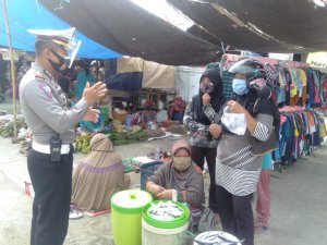 Polres Pasangkayu Gencarkan Sosialisasi Masker di Pasar