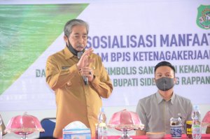 Dollah Mando Serahkan Bantuan Kematian Rp420 Juta untuk Ahli Waris Peserta BPJAMSOSTEK