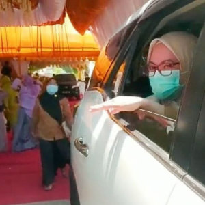 Respons Pandemi, Pegawai Kominfo Lutra Rayakan Pernikahaan Konsep ‘Drive Thru’
